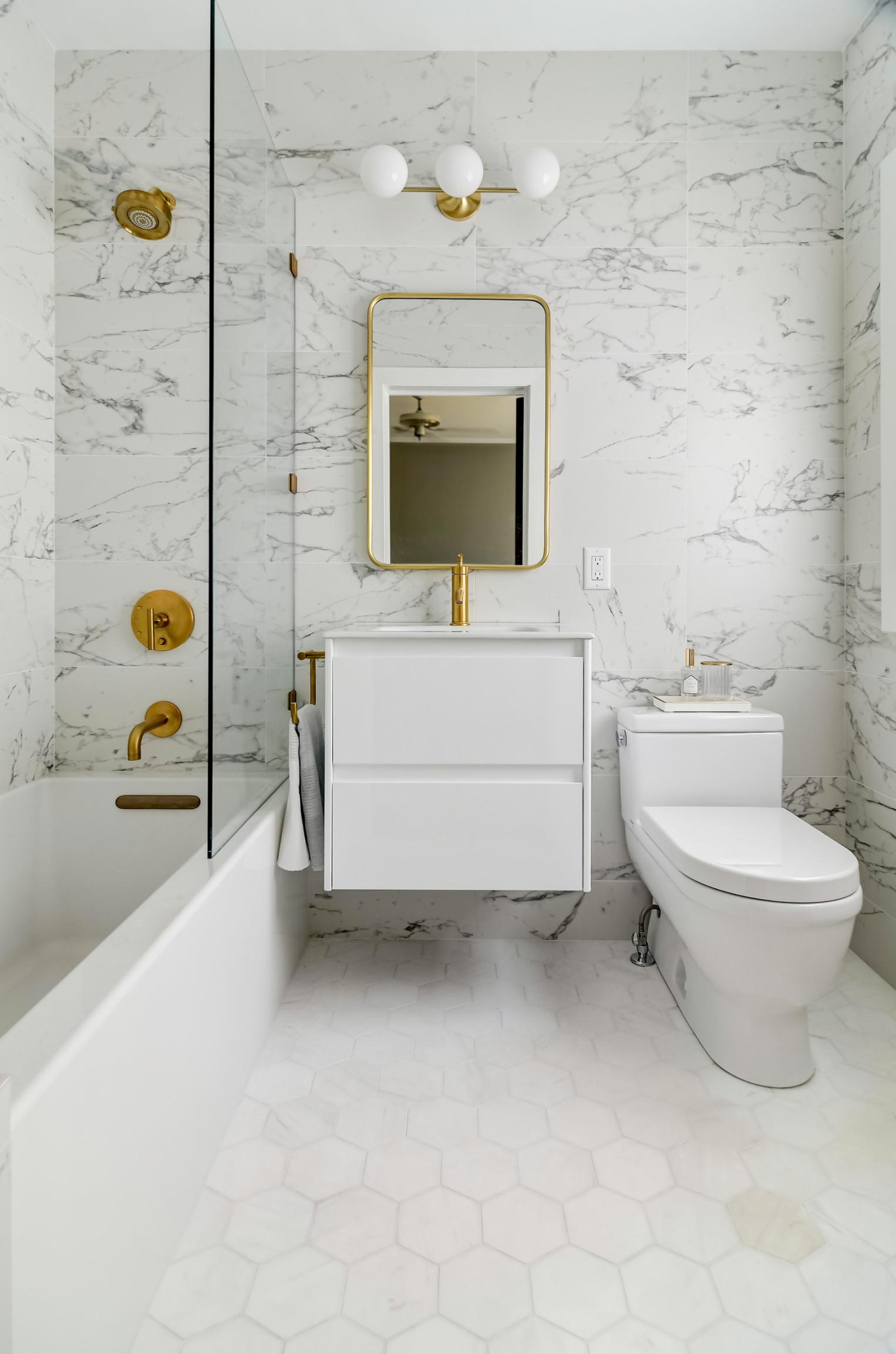 image.title Bathroom Tour: Tile and Brass Update a Tiny Bath in Minneapolis image